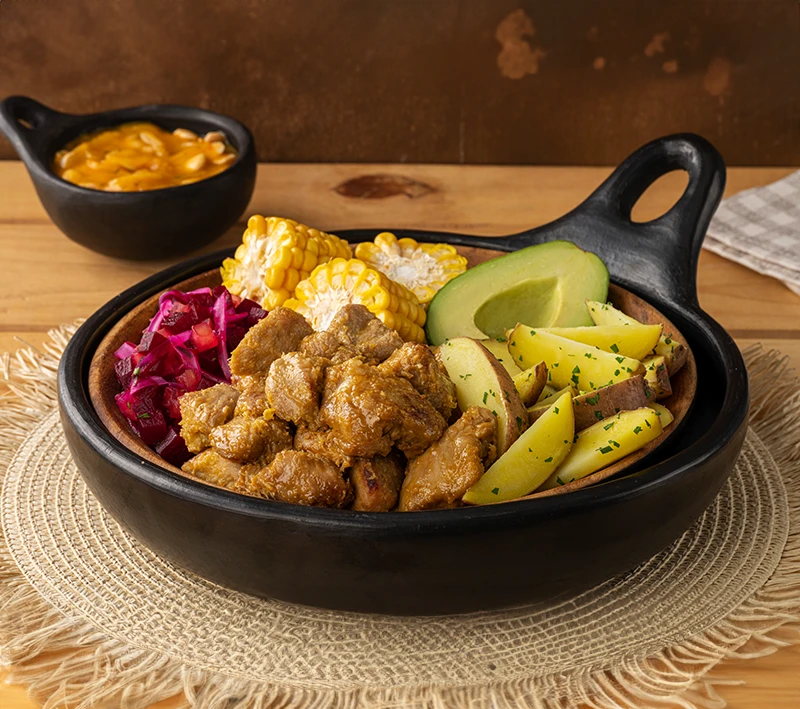 Fritada de chancho con naranja y canela
